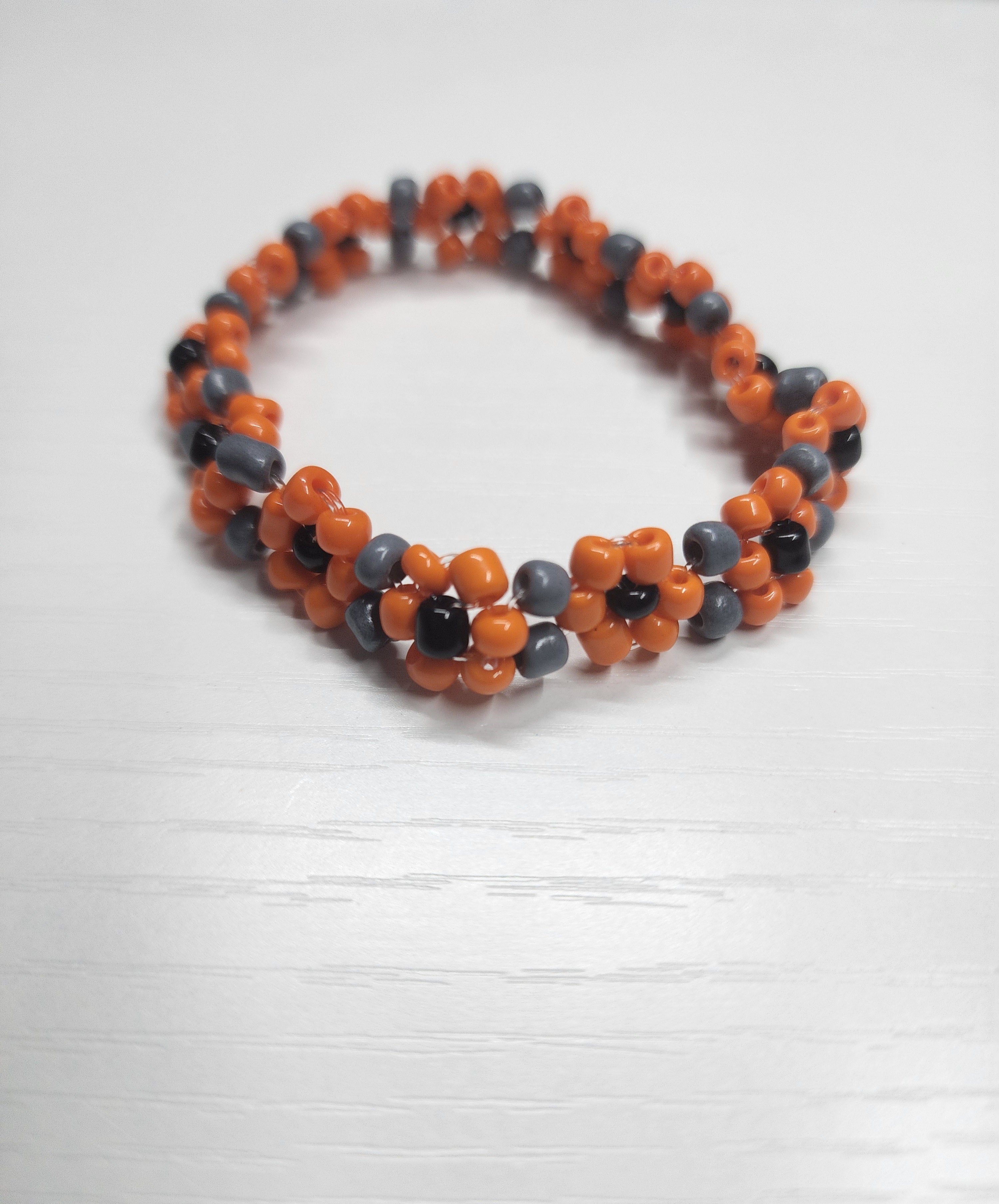 Orange demon beads bracelet